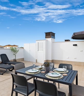 65m2 dakterras met loungeset en eettafel