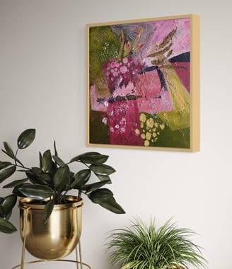Adele’s abstract painting framed on the wall in living room