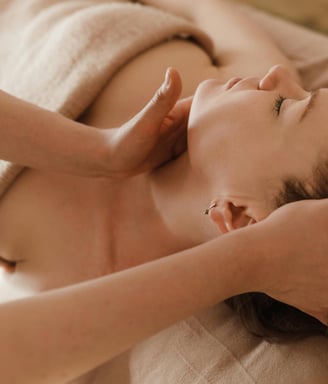 women with a facial massage