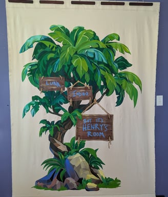 6-foot by 5-foot linen canvas tapestry mural of a lush jungle tree in greens and blues,, with signs and painted names.