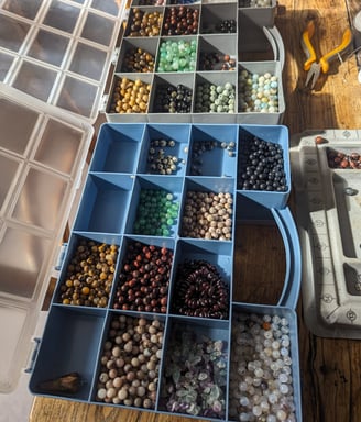 a bunch of beads and beads on a table