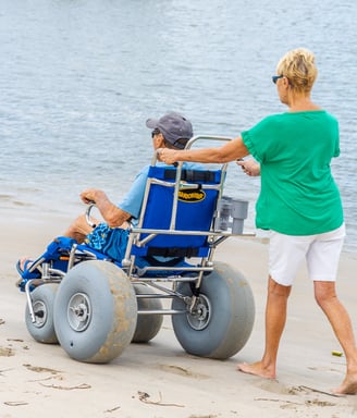 Using a beach wheelchair in the beach in Thailand. Making our beach accessible.