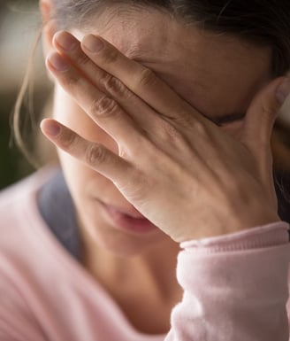 een vrouw die stress ervaart