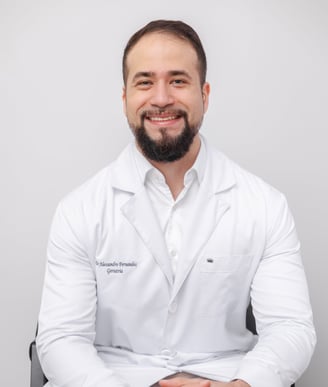 a man in a white lab coat and a white lab coat