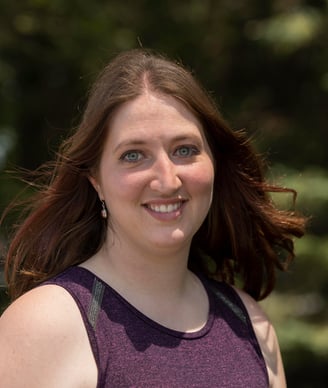 a woman with a purple shirt