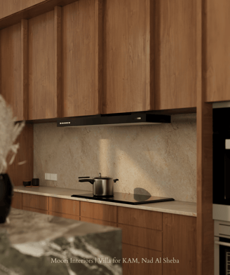Contemporary kitchen cooktop with matte chimney, warm wood cabinetry, and soft ambient lighting