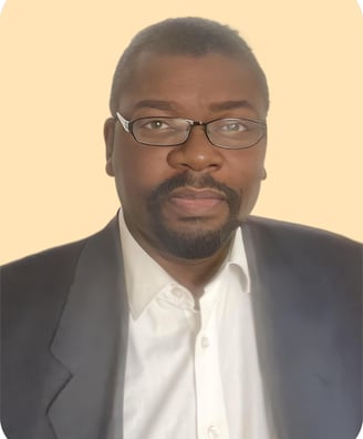 a man in a suit and glasses with a white shirt