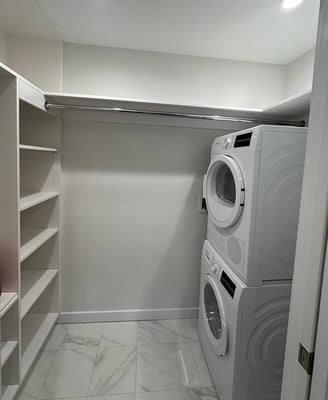a laundry room with a washer and dryer