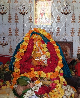 a statue of a woman in a flowered dress