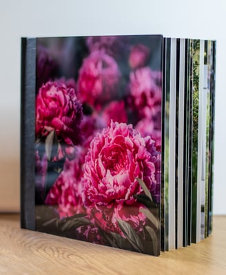 a book with a picture of a bunch of flowers