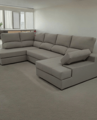 a couch with a large sectional couch in a living room