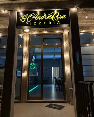 Ingresso di AndrèsRosa Pizzeria ad Alseno, specializzata in pizza artigianale e contemporanea