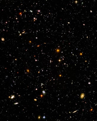 The Hubble deep field view, about one 24-millionth of the whole sky.  Each spec of light a Galaxy!