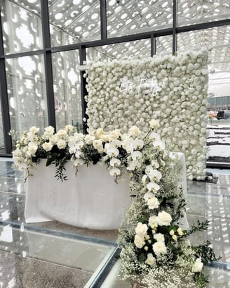 The white rose flower wall at the Hotel X downtown Toronto for a Engagement party