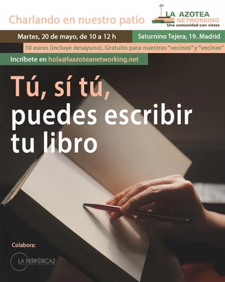 a person holding a pen and writing on a book