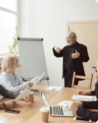 Male leading the conversation at a meeting
