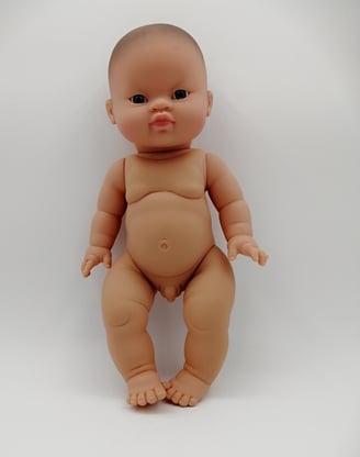 Minikane boy doll standing