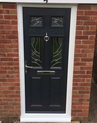 black composite door with chrome hardware and patterned glass fitted in hythe by buildmydoor