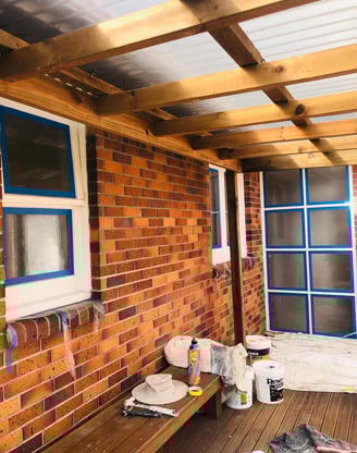 a bench with a bench and a window