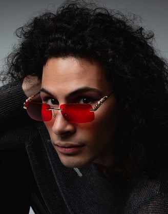 a drummer with red sunglasses