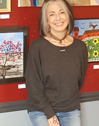 Photo-of-author-artist-at-art-show