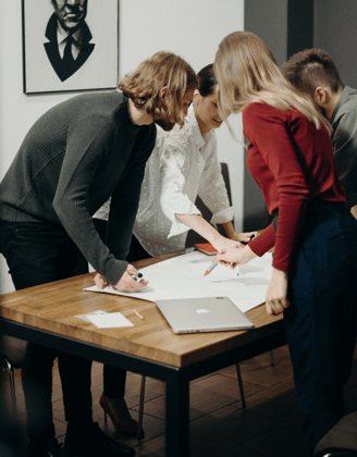 An image depicting people working collaboratively on improvement activity.