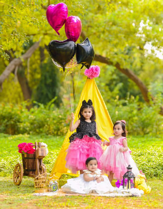 three girls wearing pretty dress