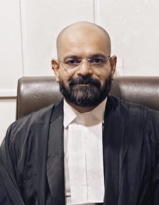 Adv. Tejas R. Patil (B.Com., LL.B.)