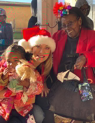 Angie Crouch with Mama Hill at annual Christmas Party for children in Watts