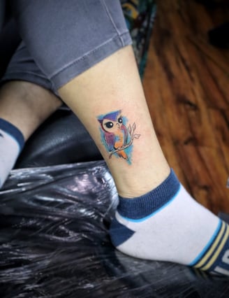 Watercolor Owl tattoo by Dudo's Tattoos Hyderabad