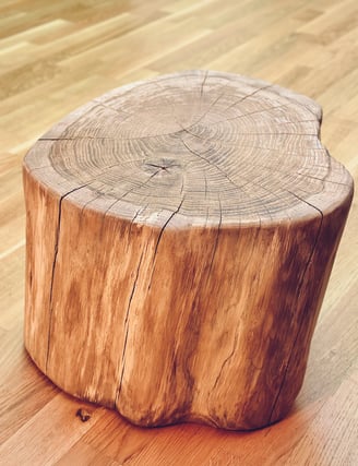a wooden table with a wooden stump