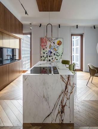 a kitchen with a marbled counter top