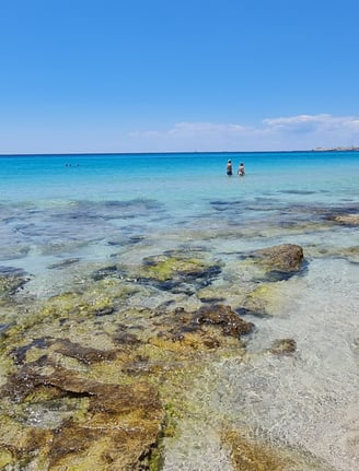 Baia Verde Beach, Puglia – A lively stretch of golden sand and shallow, transparent waters near Gall