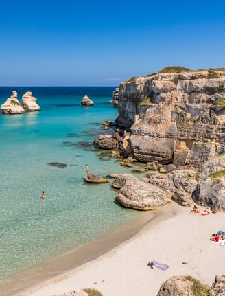 "Torre dell’Orso Beach, Puglia – A stunning coastal destination with fine sand, crystal-clear waters