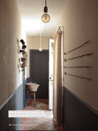 a hallway with a chair and a table, interior design, normandy cottage, vintage decor