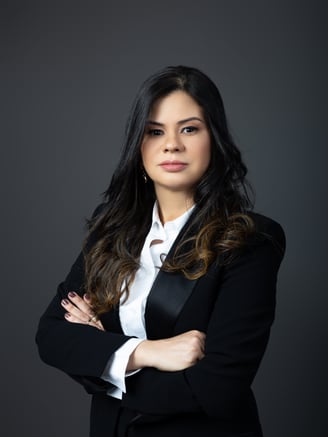 a woman in a suit and tie is posing for a portrait elane marques