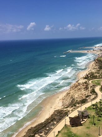 a beach with a view of the sea
