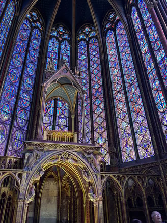 a church with a large stained glass window