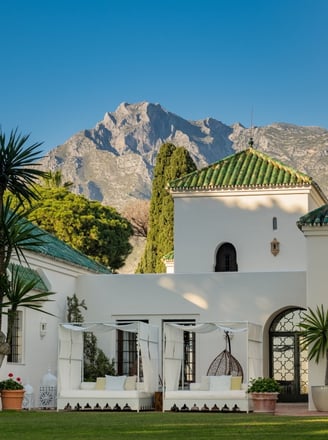 Garden view of Villa El Rincon with the iconic La Concha mountain as a stunning backdrop.