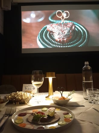Watching The Menu at a restaurant cinema
