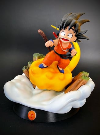 figurine en résine de goku dans dragon ball sur son nuage peinte à la main