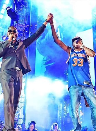 Vybz Kartel performing on stage.