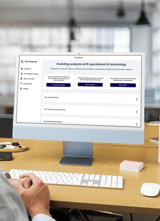 user using the financier web app displayed on a desktop screen