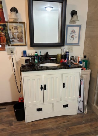 This bathroom remodel added a new sink with storage space in Goshen, IN.