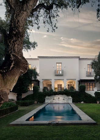 Finca Santa Katerina pool and facade seen at sunset