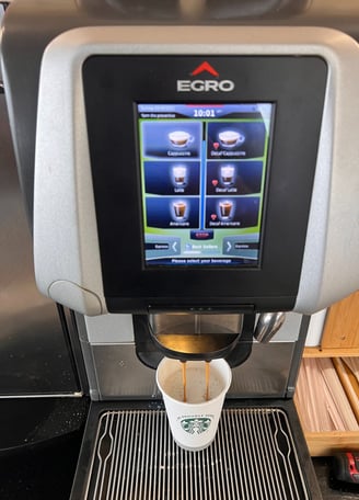 Egro One Touch espresso machine preparing a coffee beverage in South Florida