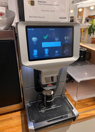 Egro NEXT espresso machine brewing Americano at a WeWork location