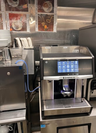 Eversys Cameo espresso machine installed in a commercial kitchen.
