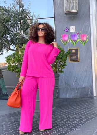 Nadia Buari in a pink dress.