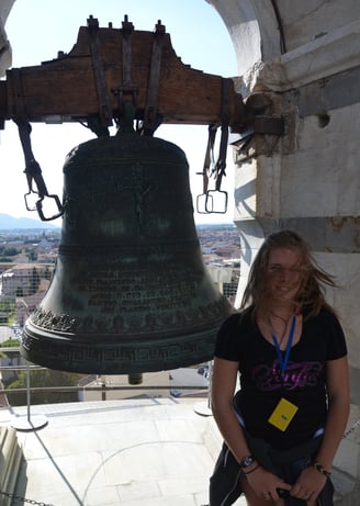 Kyrstin at bell atop Leaning Tower of Pisa